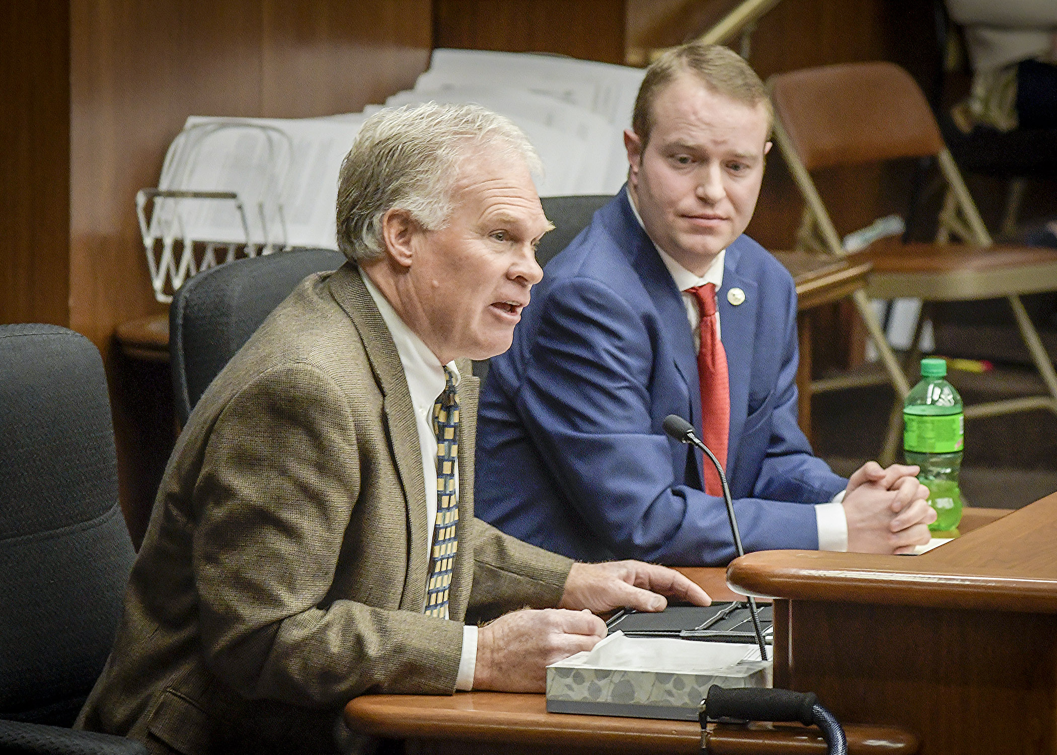 ALS Association Board Member Mark Buermann testifies before the House Health and Human Services Reform Committee March 8 in support of a bill sponsored by Rep. Nick Zerwas, right, that would modify provisions in the Minnesota Health Records Act. Photo by Andrew VonBank